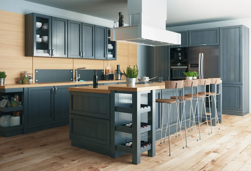 Modern kitchen with deep blue cabinets and light wood countertops. Modern kitchen with deep blue cabinets and light wood countertops.
