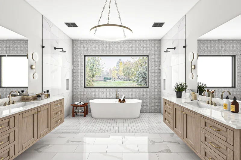 Luxury master bathroom remodel featuring a freestanding tub and double vanities. Luxury master bathroom remodel featuring a freestanding tub and double vanities.